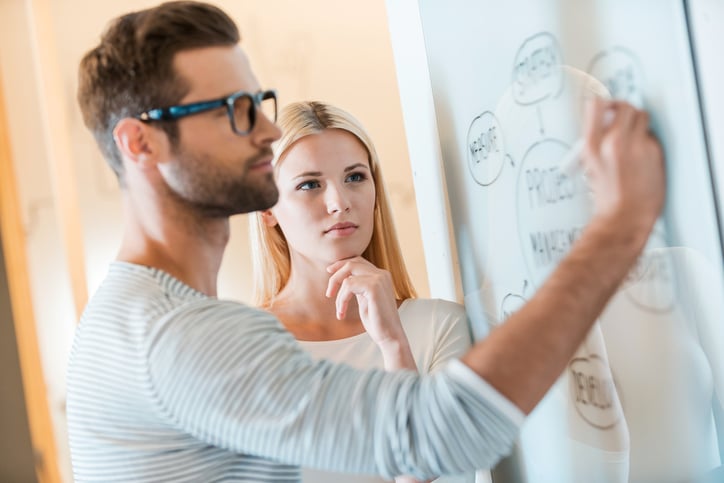 Financial organizations' employees discussing to launch a mentoring program 