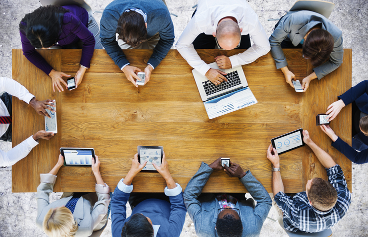 employees in a mentoring session