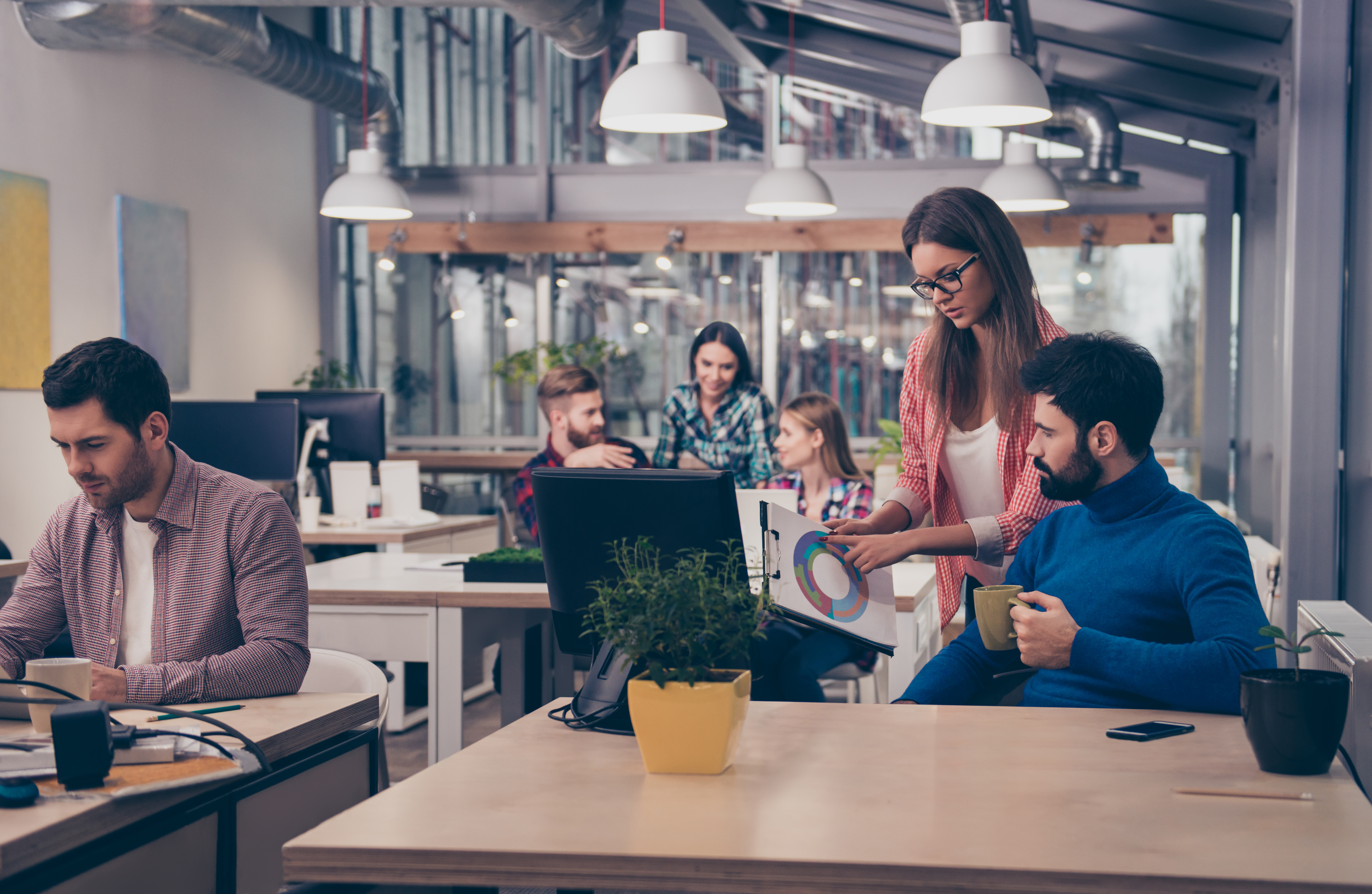 Employees providing notes and deliverables on when is the best time to incorporate a mentoring software for the mentoring program in use  